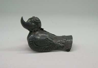  <em>Parrot Figure</em>, 1100-1500. Silver, 1 1/4 x 15/16 x 1 7/8in. (3.2 x 2.4 x 4.8cm). Brooklyn Museum, Gift of the Ernest Erickson Foundation, Inc., 86.224.24. Creative Commons-BY (Photo: Brooklyn Museum, CUR.86.224.24.jpg)
