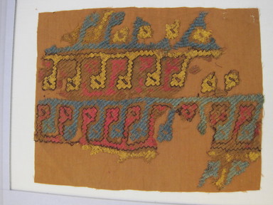 Nasca-Wari (attrib by Nobuko Kajatani, 1993). <em>Textile Fragment, possibly a Mantle Fragment</em>, 200-1000. Cotton, camelid fiber, 9 3/4 × 13 in. (24.8 × 33 cm). Brooklyn Museum, Gift of the Ernest Erickson Foundation, Inc., 86.224.64. Creative Commons-BY (Photo: , CUR.86.224.64.jpg)
