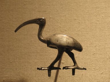  <em>Ibis</em>, 305-30 B.C.E. Silver, Height: 2 3/4in. (7cm). Brooklyn Museum, Gift of the Ernest Erickson Foundation, Inc., 86.226.19. Creative Commons-BY (Photo: Brooklyn Museum, CUR.86.226.19_wwg8.jpg)