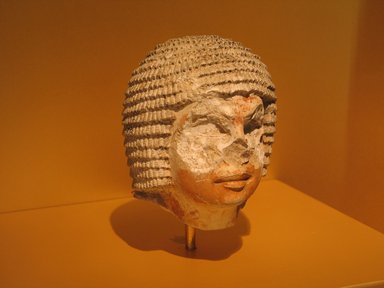  <em>Head from a Tomb Statue of a Man</em>, ca. 2500-2350 B.C.E. Limestone, pigment, 5 7/16 × 4 7/16 × 4 11/16 in. (13.8 × 11.3 × 11.9 cm). Brooklyn Museum, Gift of the Ernest Erickson Foundation, Inc., 86.226.1. Creative Commons-BY (Photo: Brooklyn Museum, CUR.86.226.1_view1_erg456.jpg)