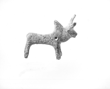 Amlash. <em>Miniature Humped Bull</em>, ca. 9th century B.C.E. Bronze, 1 1/2 x 1 3/4in. (3.8 x 4.4cm). Brooklyn Museum, Gift of the Ernest Erickson Foundation, Inc., 86.226.55. Creative Commons-BY (Photo: , CUR.86.226.55_NegID_86.226.51_GRPA_print_cropped_bw.jpg)