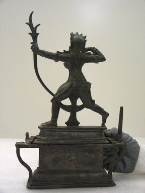 Vijayanagara. <em>Female Deity, probably Rati</em>, 14th century or later. Bronze, with stand: 12 3/4 x 8 x 2 1/4 in. (32.4 x 20.3 x 5.7 cm). Brooklyn Museum, Gift of the Ernest Erickson Foundation, Inc., 86.227.26. Creative Commons-BY (Photo: Brooklyn Museum, CUR.86.227.26a-b_back.jpg)