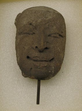  <em>Fragment of a Head</em>, 12th-13th century. Stucco, grey sandstone, 4 5/16 x 2 7/16 x 2 15/16 in. (11 x 6.2 x 7.5 cm). Brooklyn Museum, Gift of the Ernest Erickson Foundation, Inc., 86.227.42. Creative Commons-BY (Photo: Brooklyn Museum, CUR.86.227.42.jpg)