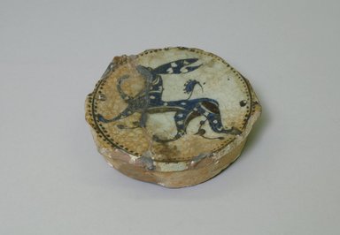  <em>Fragment of a Bowl</em>, 12th-13th century. Ceramic, blue, black and gray underglaze decoration, transparent colorless glaze, 1 5/16 x 5 1/16 in. (3.3 x 12.8 cm). Brooklyn Museum, Gift of the Ernest Erickson Foundation, Inc., 86.227.58. Creative Commons-BY (Photo: Brooklyn Museum, CUR.86.227.58.jpg)