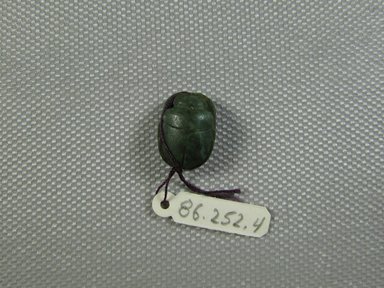  <em>Scarab</em>, 664–525 B.C.E. Jasper, 7/16 x 5/16 x 9/16 in. (1.1 x 0.8 x 1.5 cm). Brooklyn Museum, Gift of Jerome A. and Mary Jane Straka, 86.252.4. Creative Commons-BY (Photo: Brooklyn Museum, CUR.86.252.4_view1.jpg)