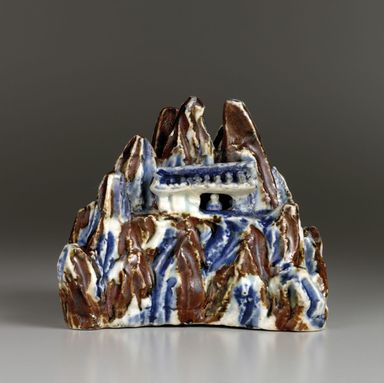  <em>Waterdropper-Brushrest in Diamond Mountain Form</em>, 19th century. Porcelain, underglaze, iron, 3 3/8 × 3 3/4 in. (8.5 × 9.5 cm). Lent by the Carroll Family Collection, L2018.6.9 (Photo: , CUR.L2018.6.9.jpg)