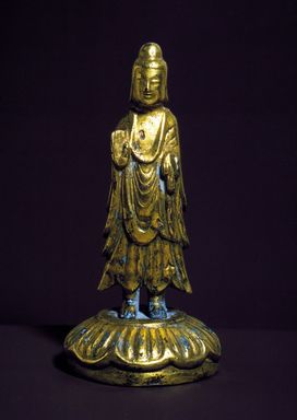  <em>Figure of Standing Seokga (Shakyamuni) Buddha</em>, First half of 6th century. Gilt bronze, height: 5 1/2 in. (14 cm). Lent by the Carroll Family Collection, L2021.3.1 (Photo: , CUR.L2021.3.1.jpg)