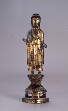  <em>Figure of Standing Seokga (Shakyamuni) Buddha</em>, ca. 7th century. Gilt bronze, height with base: 7 11/16 in. (19.6 cm). Lent by the Carroll Family Collection, L2021.3.5 (Photo: , CUR.L2021.3.5.jpg)