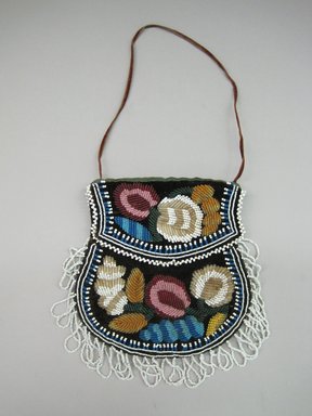 Iroquois. <em>Beaded Bag</em>, ca. 1880. Cloth, beads, silk, velvet, Including fringe but excluding strap: 8 1/2 × 1/2 × 7 1/4 in. (21.6 × 1.3 × 18.4 cm). Brooklyn Museum, Gift of the Edward J. Guarino Collection in honor of Kathleen Guarino-Burns, 2016.11.11. Creative Commons-BY (Photo: Brooklyn Museum, CUR.TL2016.18.11_view1.jpg)