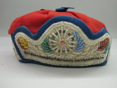 Iroquois. <em>Crown Style Cap</em>, ca. 1880-1890. Cloth, beads, 3 1/2 × 8 3/4 × 7 in. (8.9 × 22.2 × 17.8 cm). Brooklyn Museum, Gift of the Edward J. Guarino Collection in memory of Josephine M. Guarino, 2016.11.15. Creative Commons-BY (Photo: Brooklyn Museum, CUR.TL2016.18.15_front.jpg)