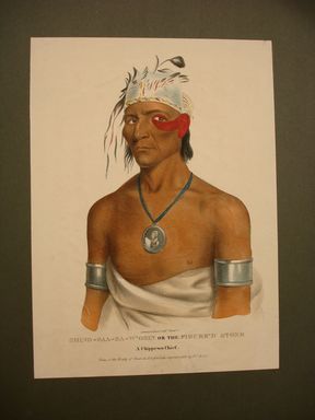 James Otto Lewis (American, 1799 – 1858). <em>Shing-Gaa-Ba-W'Osin or the Figured Stone, a Chippewa Chief</em>, issued May 1835. Lithograph with watercolor on paper, Sheet: 13 1/8 x 9 1/2 in. (33.3 x 24.1 cm). Brooklyn Museum, Brooklyn Museum Collection, X1042.147.3 (Photo: Brooklyn Museum, CUR.X1042.147.3.jpg)