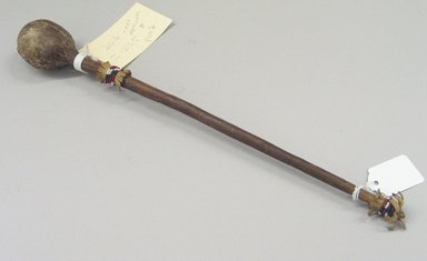  <em>Slingshot Club or Pounder</em>, late 19th century. Hide, beads, pigment, wood, Total length: 14 in. (35.6 cm). Brooklyn Museum, Brooklyn Museum Collection, X1110.2. Creative Commons-BY (Photo: Brooklyn Museum, CUR.X1110.2_view1.jpg)
