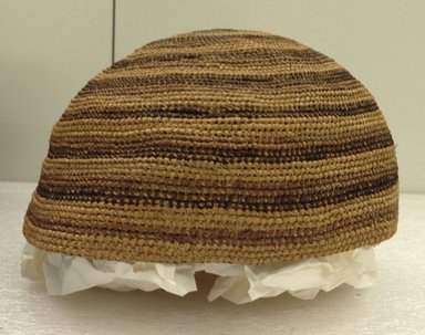 Yombe. <em>Cap</em>, late 19th century. Raffia fiber, height: 3 1/2 in. (8.9 cm); diameter: 6 1/8 in. (15.6 cm). Brooklyn Museum, Brooklyn Museum Collection
, X1124.3. Creative Commons-BY (Photo: Brooklyn Museum, CUR.X1124.3_side.jpg)