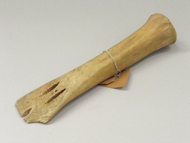 Plains. <em>Scraper</em>, 19th century. Bone, 2 1/2 x 9 1/2 in. (6.4 x 24.1 cm). Brooklyn Museum, Brooklyn Museum Collection, X1126.5. Creative Commons-BY (Photo: Brooklyn Museum, CUR.X1126.5_view1.jpg)