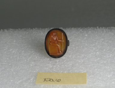 Egypto-Roman. <em>Ring with Magic Gem</em>, 1st-2nd century C.E. (probably). Carnelian, copper, gold, 7/8 x 11/16 in.  (2.3 x 1.8 cm);. Brooklyn Museum, Brooklyn Museum Collection, X20.6. Creative Commons-BY (Photo: Brooklyn Museum, CUR.X20.6_view2.jpg)