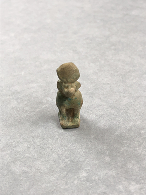  <em>Amulet in Form of a Monkey</em>, ca. 1292-1190 B.C.E. Faience, 1 3/16 × 1/2 × 1/2 in. (3 × 1.3 × 1.2 cm). Brooklyn Museum, Brooklyn Museum Collection, X249.20. Creative Commons-BY (Photo: , CUR.X249.20_view01.jpg)