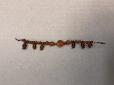  <em>Beads and Pendants</em>, ca. 1539-1292 B.C.E. Carnelian, 1/2 × 1/4 × 4 1/8 in. (1.2 × 0.6 × 10.5 cm). Brooklyn Museum, Brooklyn Museum Collection, X249.8. Creative Commons-BY (Photo: , CUR.X249.8_view01.jpg)
