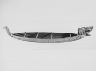 Maori. <em>War Canoe (Waka taua) Model</em>, 1860-1880. Wood, 5 x 12 x 62 5/8 in.  (12.7 x 30.5 x 159.0 cm). Brooklyn Museum, Brooklyn Museum Collection, X262. Creative Commons-BY (Photo: Brooklyn Museum, CUR.X262_print_front_bw.jpg)