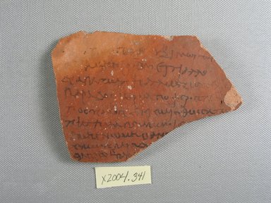  <em>Letter to Pachnoubis</em>, 2nd century C.E. Terracotta, 3 5/8 x 1/4 x 5 1/4 in. (9.2 x 0.6 x 13.4 cm). Brooklyn Museum, Brooklyn Museum Collection, X849. Creative Commons-BY (Photo: Brooklyn Museum, CUR.X849_view1.jpg)
