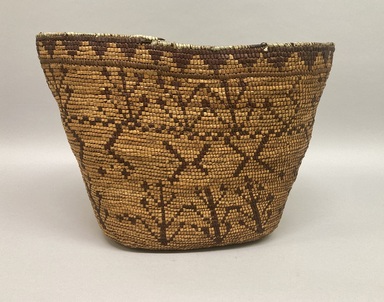 Tsilhqot'in. <em>Coiled Burden Basket</em>, 1901-1933. Fiber, 12 1/2 × 17 7/8 × 12 5/8 in. (31.8 × 45.4 × 32.1 cm). Brooklyn Museum, Brooklyn Museum Collection, X854.2. Creative Commons-BY (Photo: Brooklyn Museum, CUR.X854.2_overall01.JPG)
