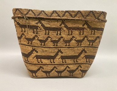 Tsilhqot'in. <em>Coiled Burden Basket</em>, 1901-1933. Plant fiber, wood, 30 1/4 x 18 x 13 in. (76.8 x 45.7 x 33 cm). Brooklyn Museum, Brooklyn Museum Collection, X854.3. Creative Commons-BY (Photo: Brooklyn Museum, CUR.X854.3_overall01.JPG)