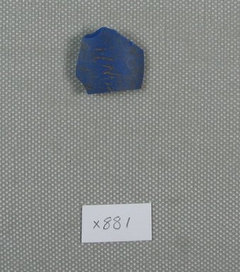  <em>Fragment</em>, ca. 1352-1332 B.C.E. Glass, 11/16 x 13/16 in. (1.8 x 2 cm). Brooklyn Museum, Brooklyn Museum Collection, X881. Creative Commons-BY (Photo: Brooklyn Museum, CUR.X881_view1.jpg)