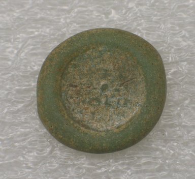  <em>Weight</em>, 12th century or later. Glass, 3/16 x 1 in. (0.5 x 2.5 cm). Brooklyn Museum, Brooklyn Museum Collection, X888.5. Creative Commons-BY (Photo: Brooklyn Museum, CUR.X888.5_front.jpg)