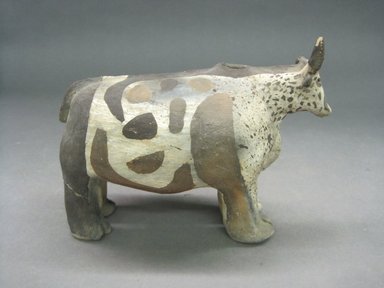 She-we-na (Zuni Pueblo). <em>Four Legged Effigy Vessel in the Shape of a Cow</em>, ca. 1875. Clay, 5 3/4 x 7 3/4 in. (14.6 x 19.7 cm). Brooklyn Museum, Brooklyn Museum Collection, X898.4. Creative Commons-BY (Photo: Brooklyn Museum, CUR.X898.4_view1.jpg)