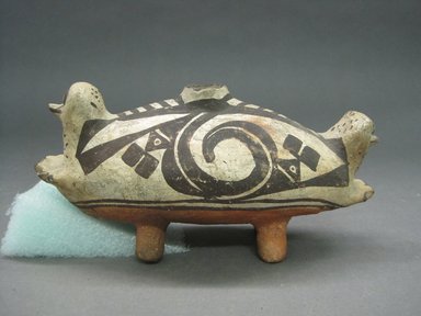 Haak’u (Acoma Pueblo). <em>Double-Headed Duck-shaped Effigy Vessel</em>, 1801-1900. Clay, pigment, 4 x 9 x 3 1/2 in (10.2 x 22.8 x 8.9 cm). Brooklyn Museum, Brooklyn Museum Collection, X898.7. Creative Commons-BY (Photo: Brooklyn Museum, CUR.X898.7_view1.jpg)