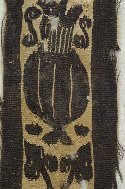 Coptic. <em>Band Fragment with Potted Botanical Decoration</em>, 4th–7th century C.E. Flax, wool, 4 3/4 x 2 in. (12.1 x 5.1 cm). Brooklyn Museum, Brooklyn Museum Collection, X934. Creative Commons-BY (Photo: Brooklyn Museum (in collaboration with Index of Christian Art, Princeton University), CUR.X934_detail01_ICA.jpg)