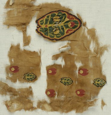 Coptic. <em>Fragment with Botanical Decoration</em>, 5th-6th century C.E. Flax, wool, 9 3/4 x 9 in. (24.8 x 22.9 cm). Brooklyn Museum, Brooklyn Museum Collection, X940. Creative Commons-BY (Photo: Brooklyn Museum (in collaboration with Index of Christian Art, Princeton University), CUR.X940_ICA.jpg)