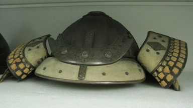  <em>Helmet</em>, 17th century. Steel, lacquer, silk, leather, gilt-bronze, 9 1/2 x 16 in. (24.1 x 40.6 cm). Brooklyn Museum, Brooklyn Museum Collection, X953. Creative Commons-BY (Photo: , CUR.X953.jpg)