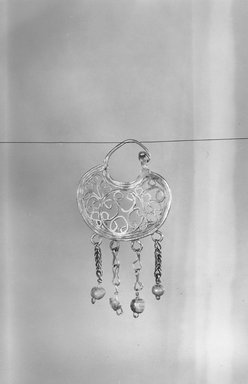  <em>Single Earring</em>, 2nd–3rd century C.E. Gold, glass, 1 3/4 x 15/16 in. (4.4 x 2.4 cm). Brooklyn Museum, Brooklyn Museum Collection, X16. Creative Commons-BY (Photo: Brooklyn Museum, CUR.x16_NegA_print_bw.jpg)