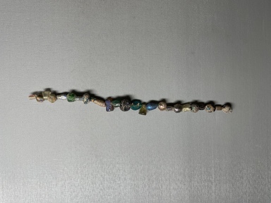  <em>Necklace Fragments</em>, prior to about 800 C.E. Glass, 10 5/8 in.  (27 cm). Brooklyn Museum, Brooklyn Museum Collection, X573. Creative Commons-BY (Photo: Brooklyn Museum, CUR.x573.JPG)