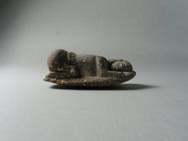  <em>Erotic Figure of a Female</em>, 664-525 B.C.E. Clay, 1/2 x 11/16 x 2 5/16 in. (1.3 x 1.8 x 5.8 cm). Brooklyn Museum, Brooklyn Museum Collection, X865.2. Creative Commons-BY (Photo: Brooklyn Museum, CUR.x865.2_view03.jpg)