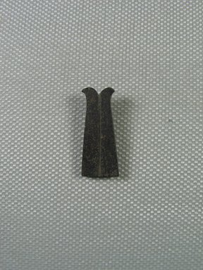  <em>Pesesh-kef Knife Amulet</em>, 664–332 B.C.E. Basalt, 1 x 3/8 x 3/16 in. (2.5 x 1 x 0.4 cm). Brooklyn Museum, Charles Edwin Wilbour Fund, 05.381. Creative Commons-BY (Photo: Brooklyn Museum, CUR_05.381_view01.jpg)