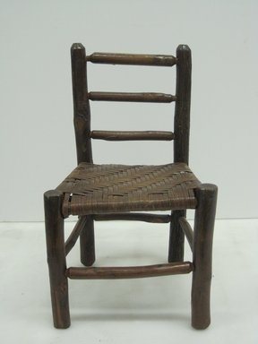 Unknown. <em>Child's Side Chair</em>, 20th century. Wood and reed, 20 7/8 x 12 1/4 x 10 1/2 in. (53 x 31.1 x 26.7 cm). Brooklyn Museum, Maria L. Emmons Fund, 2002.69.2. Creative Commons-BY (Photo: Brooklyn Museum, CUR_2002.69.2_view1.jpg)