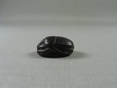  <em>Scarab</em>. Steatite, 3/8 x 11/16 x 15/16 in. (1 x 1.8 x 2.4 cm). Brooklyn Museum, Gift of Theodora Wilbour from the collection of her father, Charles Edwin Wilbour, 35.1160. Creative Commons-BY (Photo: Brooklyn Museum, CUR_35.1160_view02.jpg)