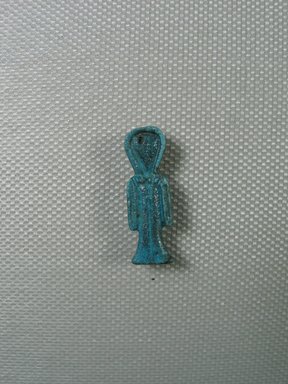  <em>Isis-knot Amulet</em>, 664–332 B.C.E. Faience, 1 x 5/16 x 1/4 in. (2.6 x 0.8 x 0.6 cm). Brooklyn Museum, Charles Edwin Wilbour Fund, 37.1234E. Creative Commons-BY (Photo: Brooklyn Museum, CUR_37.1234E_view01.jpg)