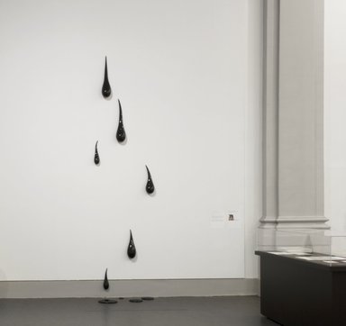 Fred Wilson (American, born 1954). <em>Drips and Drabs</em>, 2009. Blown glass, overall installation dimensions: 155 x 45 x 35 in. (393.7 x 114.3 x 88.9 cm). Brooklyn Museum, Gift of the artist and The Pace Gallery in honor of Arnold Lehman, 2015.23a-j. © artist or artist's estate (Photo: Brooklyn Museum, DIG_E_2015_Diverse_Works_20_cropped_2015.23a-j_PS8.jpg)