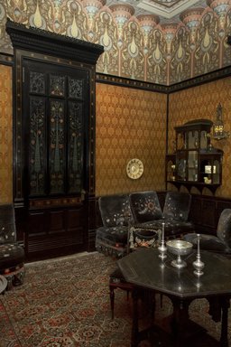 George A. Schastey (1839-1894). <em>Couch with 3 cushions (one of a pair) Aesthetic Movement style with Moorish style embroidery (Rockefeller Room)</em>, ca. 1881. Unidentified ebonized wood, original velvet upholstery, Couches: 15 1/2 x 29 1/2 x 64 in. (39.4 x 74.9 x 162.6 cm). Brooklyn Museum, Gift of John D. Rockefeller, Jr., 46.43.1. Creative Commons-BY (Photo: Brooklyn Museum, DIG_E_2015_Worsham-Rockefeller_Room_Moorish_smoking_room_01_PS8_46.43.jpg)