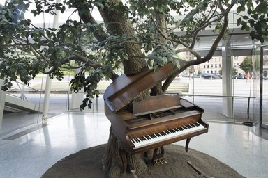 Sanford Biggers (American, born 1970). <em>Blossom</em>, 2007. Steel, plastic and synthetic fibers, wood, MIDI player piano system, Zoopoxy, pigment, soil, modelling clay, polyurethane foam, 12 x 18 x 15 feet (365.9 x 548.8 x 457.3 cm). Brooklyn Museum, Purchase gift of Toby Devan Lewis, Charles and Amber Patton, and an anonymous donor, gift of the Contemporary Art Council, and the Mary Smith Dorward Fund, 2011.10. © artist or artist's estate (Photo: Brooklyn Museum, DIG_E_2017_The_Legacy_of_Lynching_2011.10_view05_PS11.jpg)