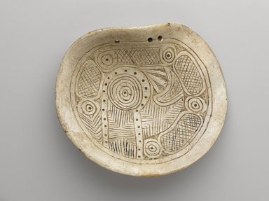 Mississippian. <em>Rattlesnake Gorget (Breast Ornament)</em>, ca. 1400. Shell, 6 1/2 x 5 3/8 in. (16.5 x 13.7 cm). Collection of Christopher B. Martin, L49.3.2. Creative Commons-BY (Photo: Brooklyn Museum, L49.3.2_PS9.jpg)