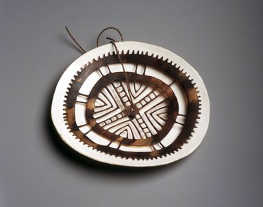 Santa Cruz Islander. <em>Ornament (Kapkap)</em>, 19th or early 20th century. Tridacna shell, tortoiseshell, fiber, 4 1/2 x 4 x 1 in. (11.4 x 10.2 x 2.5 cm). Brooklyn Museum, Brooklyn Museum Collection, X1031. Creative Commons-BY (Photo: Brooklyn Museum, X1031_transp6138.jpg)