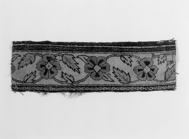  <em>Border Fragment of a Pashmina Carpet with Pattern of Lattice and Blossoms</em>, mid 17th century. Pashmina wool, silk, 14 1/2 x 4 1/2 in. (36.8 x 11.4 cm). Brooklyn Museum, Brooklyn Museum Collection, X1103.2. Creative Commons-BY (Photo: Brooklyn Museum, X1103.2_bw.jpg)