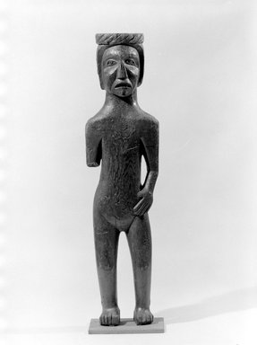 Gwa'sala Kwakwaka'wakw. <em>Wooden Figure</em>, late 19th century. Wood, hair, red pigment, 53 1/2 x 14 1/2 x 6 in. (135.9 x 36.8 x 15.2 cm). Brooklyn Museum, Brooklyn Museum Collection, X1118.1. Creative Commons-BY (Photo: Brooklyn Museum, X1118.1_bw.jpg)