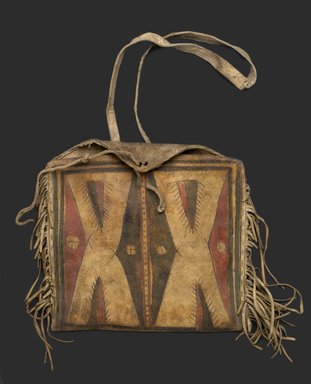 Comanche. <em>Woman's Fringed Raw Hide Bag with Strap for Carrying</em>, ca. 1900. Hide, pigment, 9 13/16 x 10 5/8 in. (25 x 27 cm). Brooklyn Museum, Brooklyn Museum Collection, X1120. Creative Commons-BY (Photo: Brooklyn Museum, X1120_PS2.jpg)