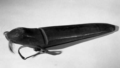 Eskimo. <em>Fish Lure Shaped like a Seal</em>. Wood, possibly seal fur, shell, fish(?) skin, 11 1/4 x 2 1/4 x 2 1/2 or (29.0 cm). Brooklyn Museum, Brooklyn Museum Collection, X584. Creative Commons-BY (Photo: Brooklyn Museum, X584_acetate_bw.jpg)