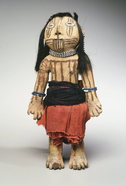 Mohave. <em>Brown Pottery Doll with Painted Line Designs</em>, late 19th–early 20th century. Clay, slip, yarn, cloth, string, beads, hair, resin, 8 1/2 x 4 x 2 in. (21.6 x 10.2 x 5.1 cm). Brooklyn Museum, Brooklyn Museum Collection, X586. Creative Commons-BY (Photo: Brooklyn Museum, X586_transpc003.jpg)