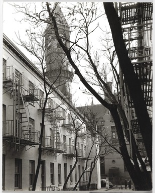 Berenice Abbott (American, 1898-1991). <em>Patchin Place with Jefferson Market Court in Background</em>, November 24, 1937. Gelatin silver print, sheet: 9 1/2 x 7 9/16 in. (24.1 x 19.2 cm). Brooklyn Museum, Brooklyn Museum Collection, X858.48 (Photo: , X858.48_PS9.jpg)